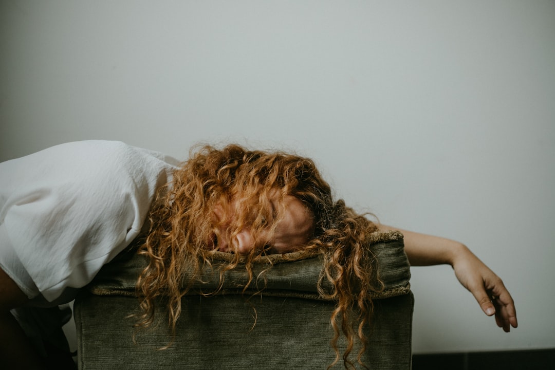 woman laying on bed